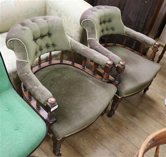 A pair of Victorian tub chairs